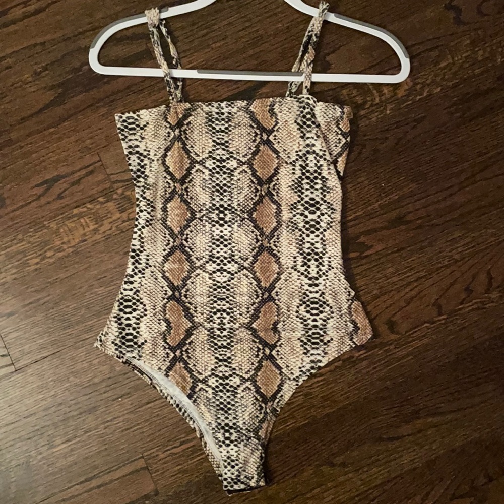 Snakeskin patterned bodysuit